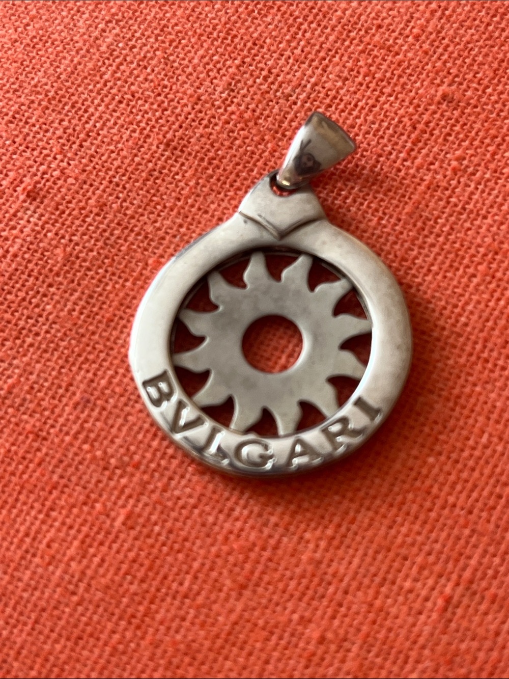 Bulgari Silver Sunburst Cutout Pendant Necklace